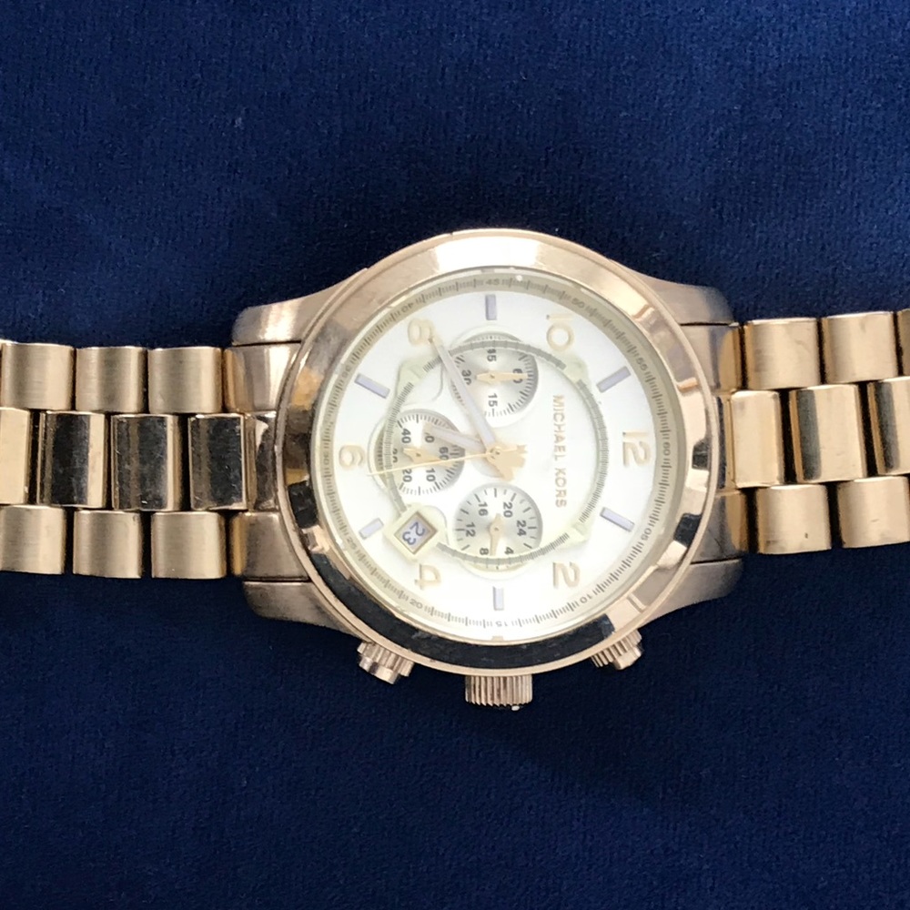 Gently used Michael Kors watch “ men’s” gold